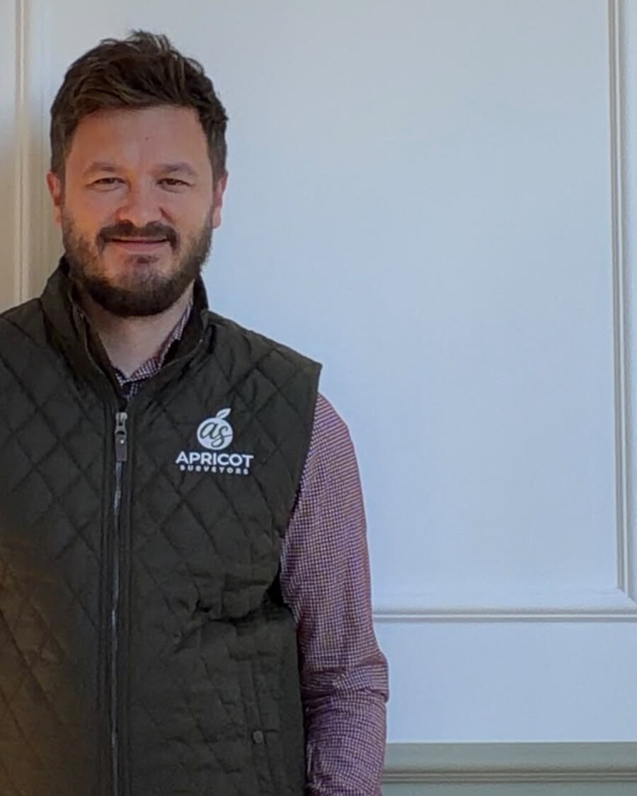 Adam Sheppard of Apricot Surveyors in a branded gilet