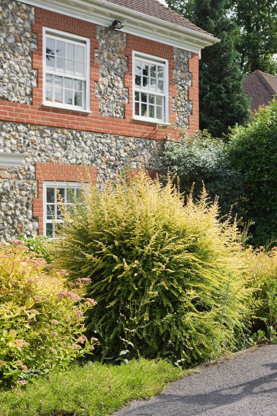 A newly built detached house with a sold board